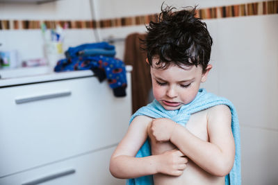 Bathing child at home