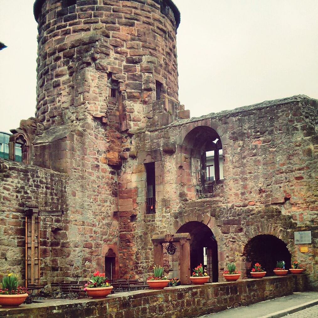 architecture, built structure, building exterior, old, abandoned, history, obsolete, weathered, damaged, old ruin, deterioration, run-down, window, arch, stone wall, the past, brick wall, ruined, low angle view, bad condition