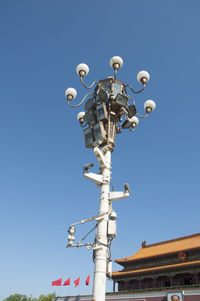 Low angle view of street light against clear sky