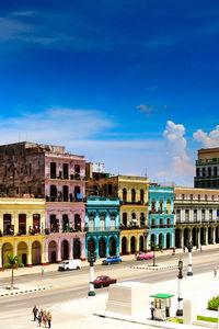 Buildings in city against sky