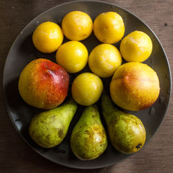 High angle view of fruits in bowl on table