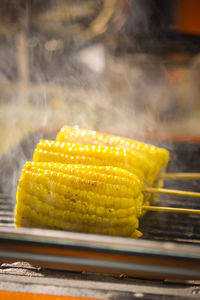 Close-up of corns on barbecue grill