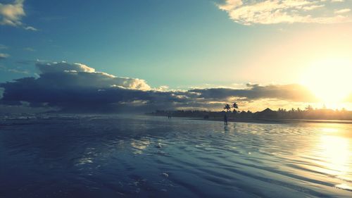 Scenic view of sea against sky at sunset