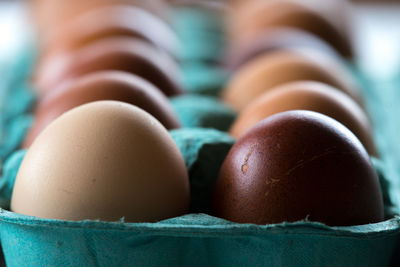 Close-up of eggs in carton