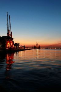 Scenic view of sea against clear sky during sunset