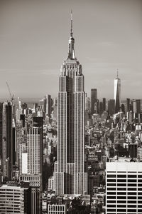 Modern buildings in city against sky