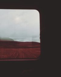 View of sky seen through train window