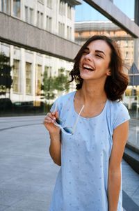 Portrait of smiling young woman