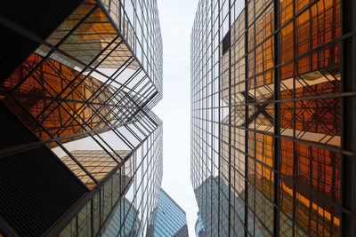 Low angle view of modern buildings against sky