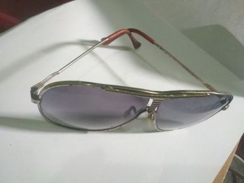 Close-up of sunglasses on table