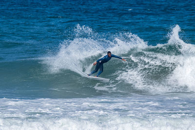 Man surfing in sea