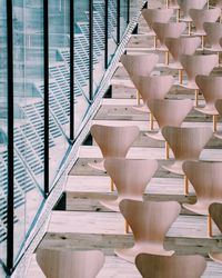 Empty wooden chairs at m/s maritime museum of denmark