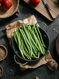 Selective focus of buncis or fresh raw string bean or french beans. in indonesia it called buncis