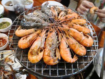 High angle view of meat on barbecue