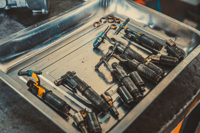 High angle view of machinery on table