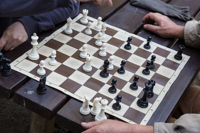 High angle view of man playing on table