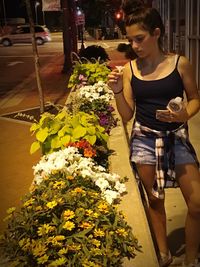 Woman holding flower bouquet