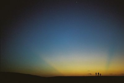 Scenic view of landscape at sunset