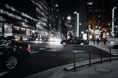 Traffic on city street at night