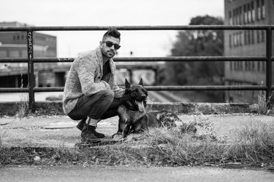 Man with dog outdoors