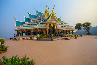 Temple against clear blue sky