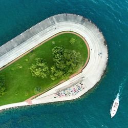 Directly above shot of boat in sea by belmont harbor