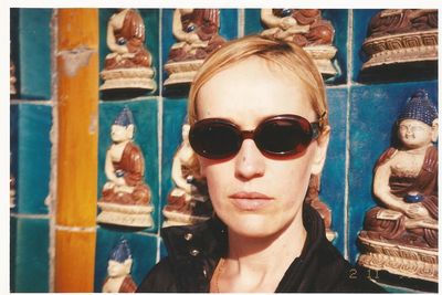 Close-up of young woman wearing sunglasses