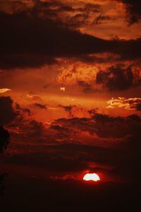 Low angle view of dramatic sky during sunset