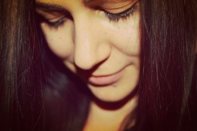 Close-up of smiling young woman