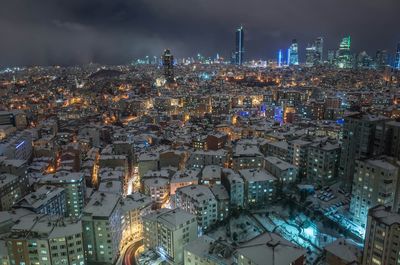 High angle view of illuminated cityscape at night