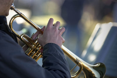 Low angle view of man playing guitar