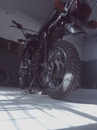 Close-up of bicycle in parking lot