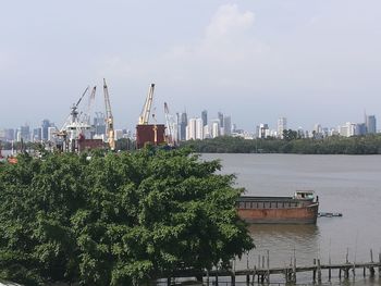 Scenic view of city against sky