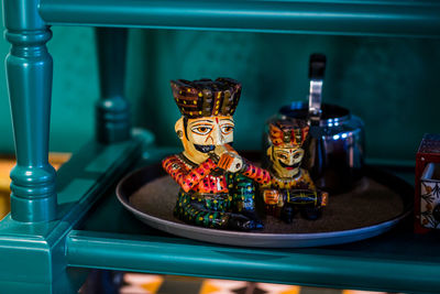 Close-up of wine bottles on table