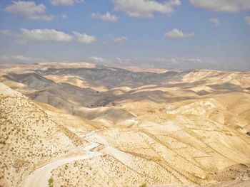 Aerial view of desert against sky