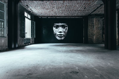 Portrait of empty corridor in abandoned building