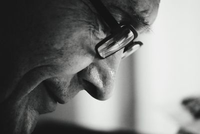 Close-up of man wearing eyeglasses