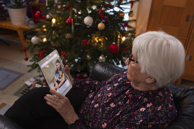 Senior woman having video call