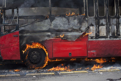 Bus burning on road