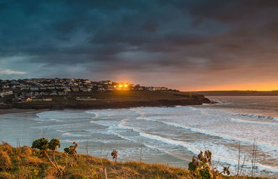 Scenic view of sea against sky at sunset