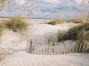 Scenic view of beach against sky