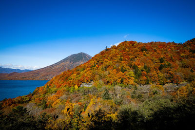 Scenic view of mountains against sky during autumn