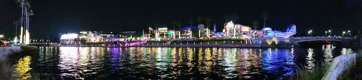 Illuminated buildings in city at night