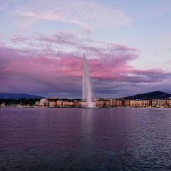 Scenic view of lake against cloudy sky