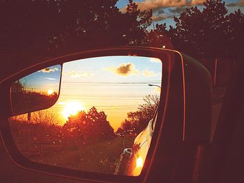 Sunset seen through car windshield