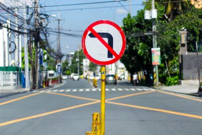 Road sign on street in city