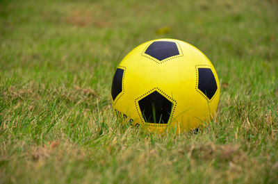 Close-up of yellow soccer field