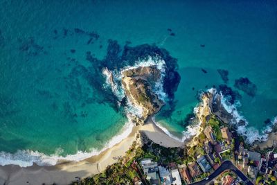 High angle view of surf on beach