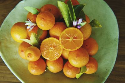 Directly above view of rangpur limes on plate