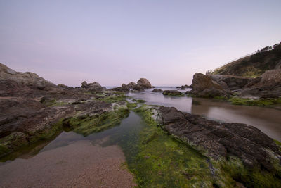 Scenic view of sea against sky during sunset